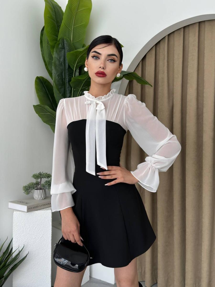 فستان قصير أنيق بتصميم يجمع بين الكلاسيكية والعصرية - صورة 1